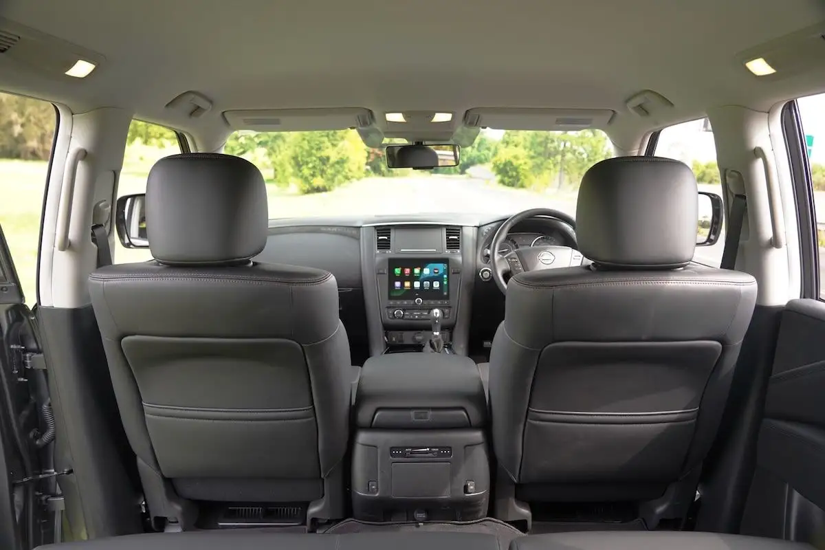 2024 Nissan Patrol Ti Warrior cockpit backseat view