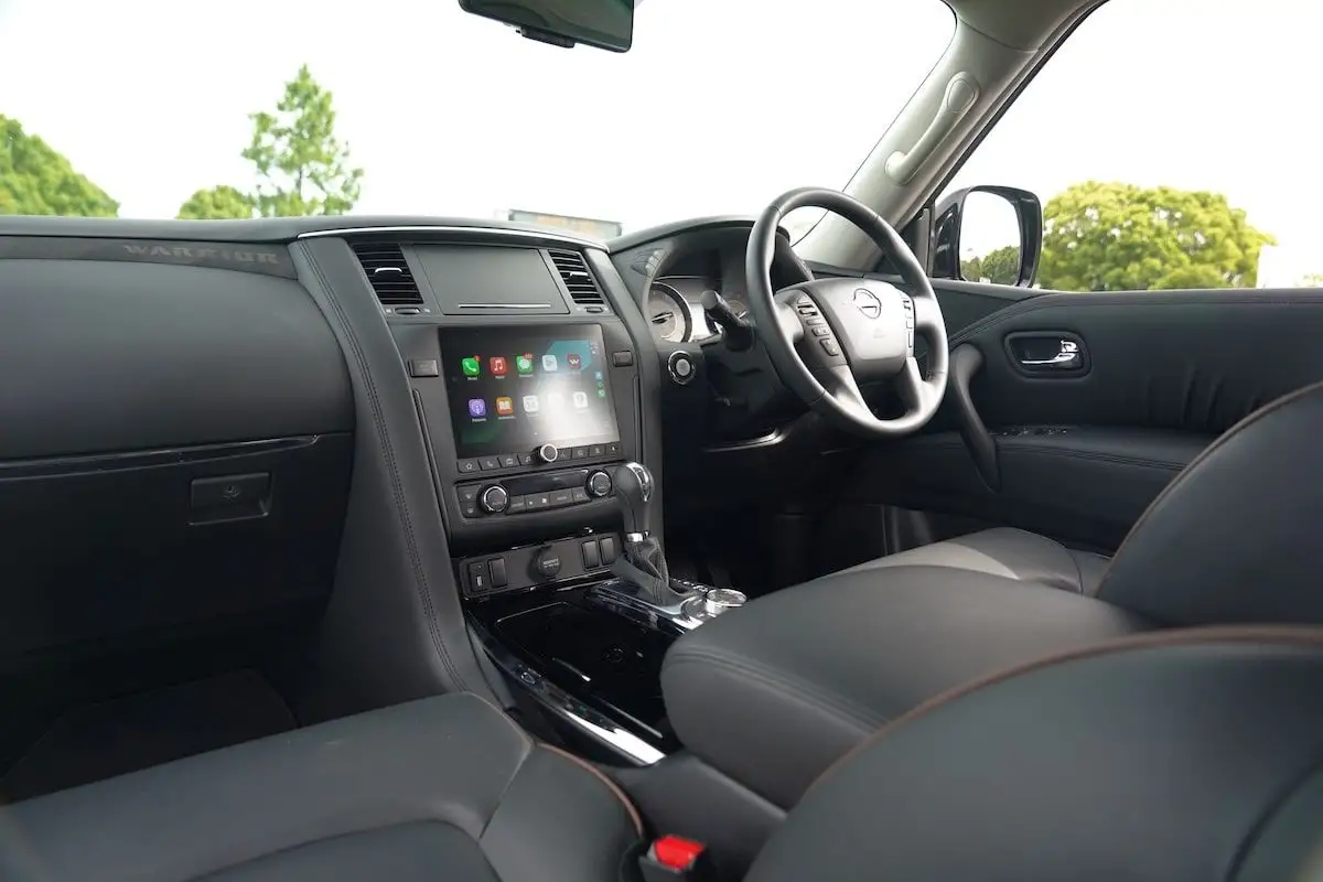 2024 Nissan Patrol Ti Warrior cockpit passenger view